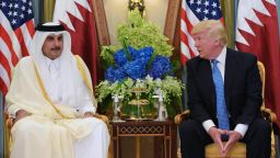 US President Donald Trump (R) and Qatar's Emir Sheikh Tamim Bin Hamad Al-Thani take part in a bilateral meeting at a hotel in Riyadh on May 21, 2017. / AFP PHOTO / MANDEL NGAN        (Photo credit should read MANDEL NGAN/AFP/Getty Images)
