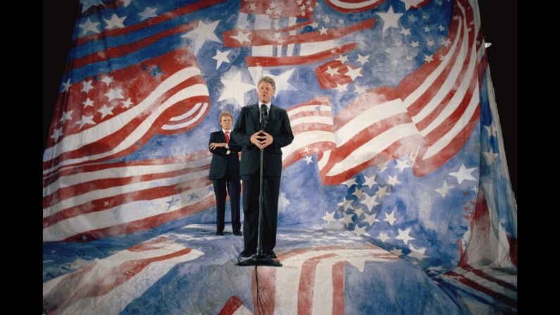 In front of former Democratic US Rep. Joseph Kennedy and a very '90s American flag, then-Democratic presidential hopeful <a href="index.php?page=&url=http%3A%2F%2Fwww.cnn.com%2F2013%2F02%2F01%2Fus%2Fbill-clinton-fast-facts%2Findex.html">Bill Clinton</a> speaks at a campaign event on April 28, 1992. After surviving a competitive Democratic primary, Clinton defeated incumbent <a href="index.php?page=&url=http%3A%2F%2Fwww.cnn.com%2F2012%2F12%2F14%2Fus%2Fgeorge-h-w-bush---fast-facts%2Findex.html">President George H.W. Bush</a> in the 1992 election to become the 42nd president of the United States.