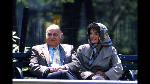 Jacqueline Kennedy Onassis is seen on April 4, 1994, in New York's Central Park with her companion, Maurice Tempelsman. The former first lady was known for her style, her love of the arts, and the low profile she kept in the wake of the assassination of her first husband, President John F. Kennedy. Just over a month after this photo was taken, the beloved former first lady died of cancer at age 64.<br />