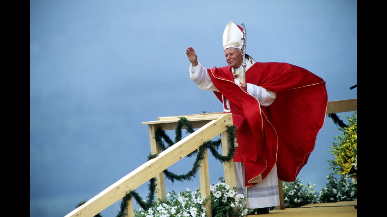 As the first non-Italian pope in 455 years, <a href="http://www.cnn.com/2013/07/02/world/pope-john-paul-ii-fast-facts/index.html">Pope John Paul II</a>'s tenure spanned three decades -- much of it on the road, making him the most-traveled pope in the Catholic Church's history. Here, the pontiff greets parishioners in 1995 during Mass in his native Poland.  