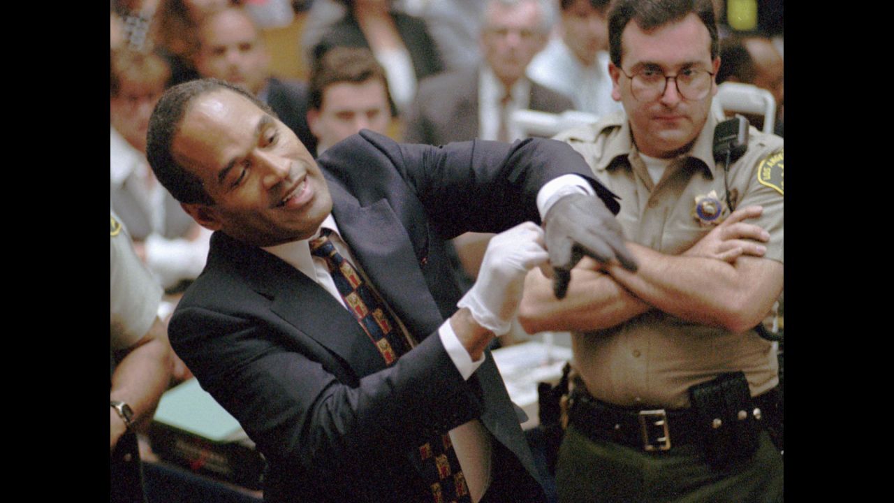 In one of the most memorable moments of a blockbuster murder trial, on June 15, 1995, <a href="http://www.cnn.com/2013/04/12/us/o-j-simpson-fast-facts/index.html">O.J. Simpson</a> struggled to fit his hand into a glove prosecutors claimed he wore the night his ex-wife Nicole Brown Simpson and Ronald Goldman were killed. The prosecution's request to have Simpson try the gloves on in court was a pivotal moment in the trial, which ended with the former NFL star's acquittal. <em>Want more? Listen to </em><a href="http://podcasts.cnn.net/embed/single/skin/07h8n0/the-trial-of-a-century.html" target="_blank" target="_blank"><em>"The Trial of a Century"</em></a><em> on CNN's </em><a href="https://itunes.apple.com/us/podcast/id1252458994" target="_blank" target="_blank"><em>"The Rewind: 90s Edition"</em></a><em> podcast.</em><br />