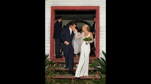 In a small ceremony on Georgia's secluded Cumberland Island, John F. Kennedy Jr. and Carolyn Bessette exchanged vows to become husband and wife on September 21, 1996. Shown leaving the chapel where they were wed, their marriage was the culmination of a courtship that fascinated the press and American public for years.