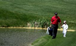 Mickelson walks with Amanda, during the Par-3 contest at The Masters in 2005.