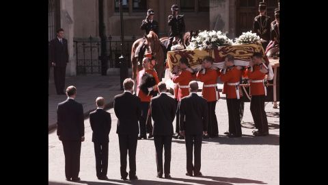 In the early morning hours of August 31, 1997, tragic news shocked the world: Princess Diana had been killed in a car crash in Paris, along with her boyfriend Dodi Fayed and their driver, Henri Paul. Here, Prince Charles, Prince Harry, Earl Charles Spencer (Diana's brother), Prince William and Prince Philip stand as Diana's coffin is taken into Westminster Abbey on September 6, 1997. Diana was beloved around the globe for her charity work, and an estimated 2.5 billion people watched the funeral.