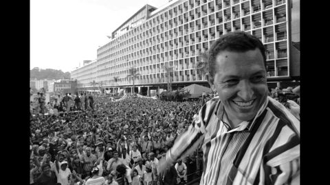 <a href="http://www.cnn.com/2012/12/11/world/americas/hugo-chavez---fast-facts/index.html">Hugo Chavez</a> is shown speaking to crowds gathered in Caracas, Venezuela, on February 4, 1998, during an anniversary celebration of his attempted 1992 coup. Though his first attempt to assume the presidency was unsuccessful, Chavez became president in 1999, and shortly after revamped the constitution to claim even more power. 