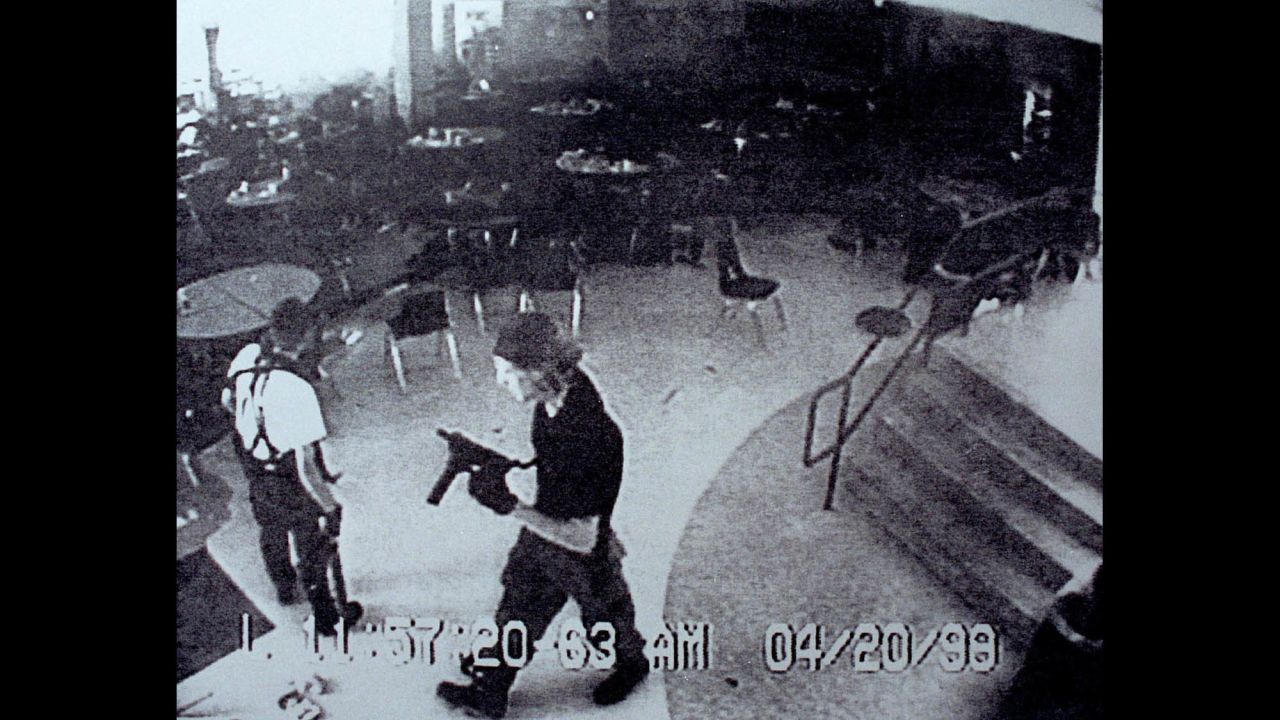 Surveillance tape from Columbine High School on April 20, 1999, shows Eric Harris, left, and Dylan Klebold carrying guns through the school's cafeteria. The two students carried out <a href="http://www.cnn.com/2013/09/18/us/columbine-high-school-shootings-fast-facts/index.html">one of the deadliest school shootings in US history</a>, killing 12 students and one teacher, before turning the guns on themselves in the school's library.