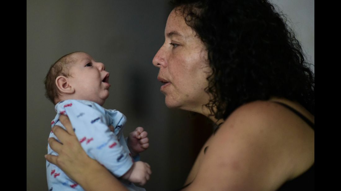 The Zika epidemic presented a threat to the health of Puerto Ricans as well as a blow to the island's tourism industry. While the <a href="http://www.cnn.com/2017/06/06/health/zika-puerto-rico-epidemic-over-bn/index.html">crisis was declared over</a> in June 2017, more than 35,000 cases were reported there in 2016, and a public health emergency was enacted. Here, Michelle Flandez holds her son Inti Perez, diagnosed with microcephaly linked to the mosquito-borne virus.