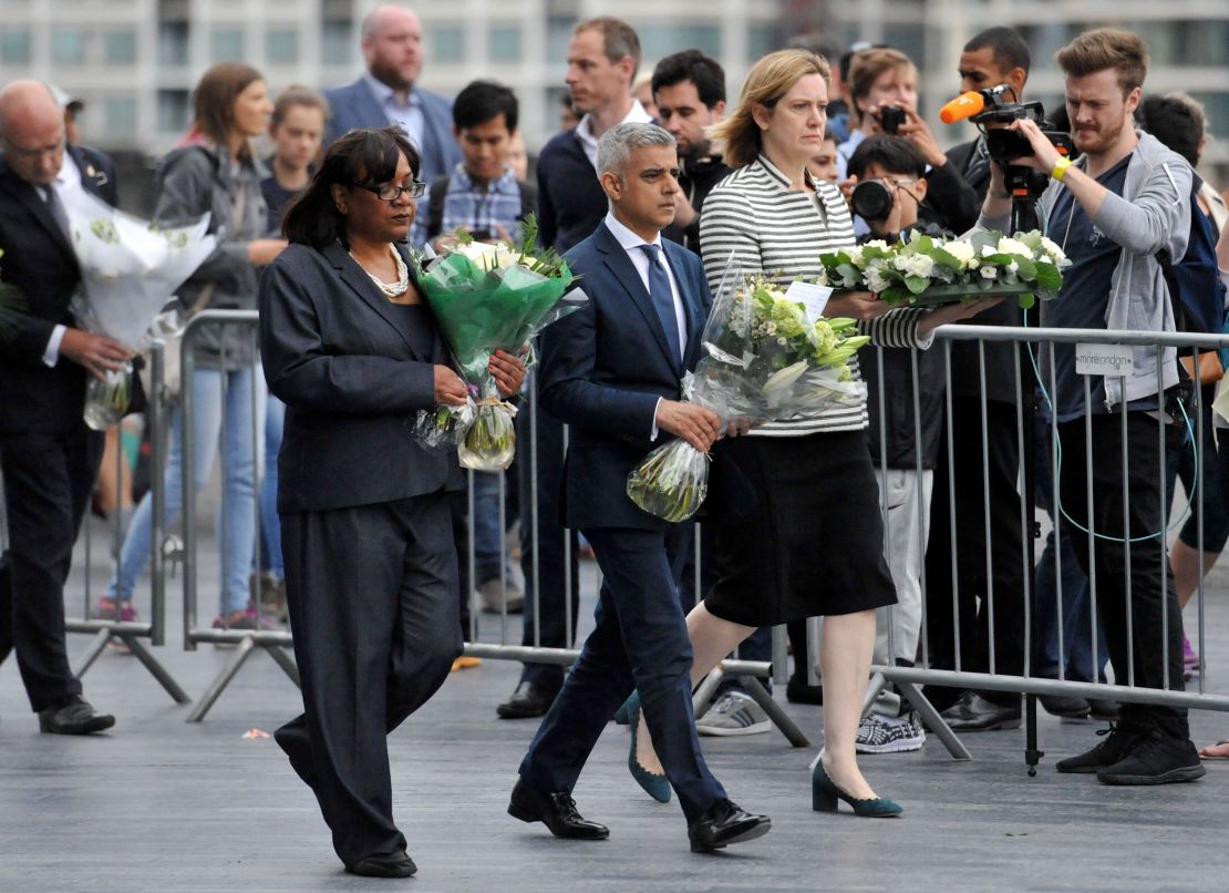 Diane Abbott (left) appears with London Mayor Sadiq Khan and then Home Secretary Amber Rudd (right) at a vigil for London Bridge terror attack victims in 2017.