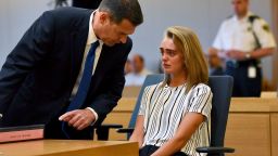 Attorney Joseph Cataldo talks to his client, Michelle Carter, before meeting at a side bar at the beginning of the court session at Taunton Juvenile Court in Taunton, Mass., on Monday, June 5, 2017.  Carter is charged with manslaughter for sending her boyfriend text messages encouraging him to kill himself. (Faith Ninivaggi/The Boston Herald via AP, Pool)