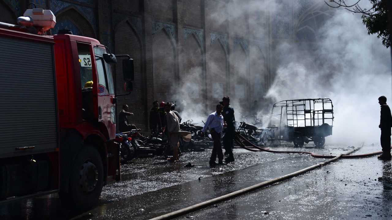 Afghan firefighters extinguish a fire at the site of a motorcycle bomb explosion in front of the Jami Mosque in Herat on June 6, 2017.


A motorcycle bomb exploded near the Grand Mosque in the western city of Herat, killing seven people and wounding 16 according to the interior ministry. / AFP PHOTO / HOSHANG HASHIMI        (Photo credit should read HOSHANG HASHIMI/AFP/Getty Images)