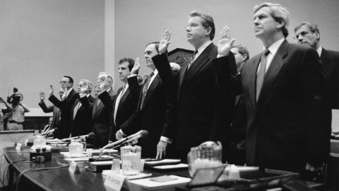 Tobacco executives are sworn in before congressional hearing.