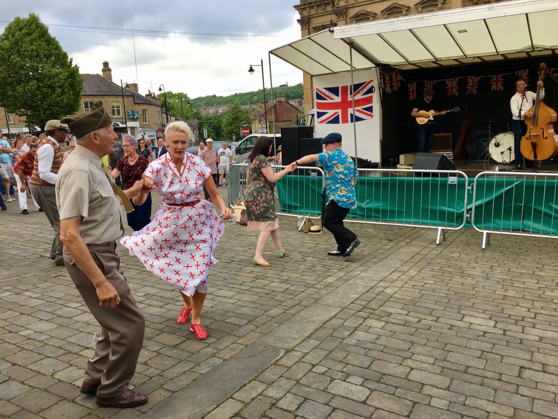 People dance to swing music at Batley's Vintage Day. Shop owner Bal Singh planned to vote for the Conservatives, but is having second thoughts. "I was very impressed with Theresa May, but all those u-turns she does undermine her appearance as a strong leader."