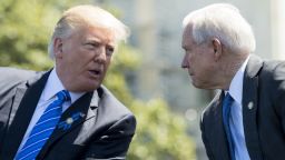 US President Donald Trump speaks with Attorney General Jeff Sessions (R) during the 36th Annual National Peace Officers Memorial Service at the US Capitol in Washington, DC, May 15, 2017. / AFP PHOTO / SAUL LOEB        (Photo credit should read SAUL LOEB/AFP/Getty Images)