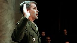 WASHINGTON, :  Lieutenant-Colonel Oliver North, former aide to former National Security Adviser John Poindexter, is sworn in 07 July 1987 before the House and Senate Foreign Affairs Committee hearing in Washington, D.C. on arms sales to Iran and diversion of profits to Nicaraguan Contra rebels. 