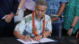 Hawaii Gov. David Ige signs laws aimed at reducing greenhouse gas emissions.