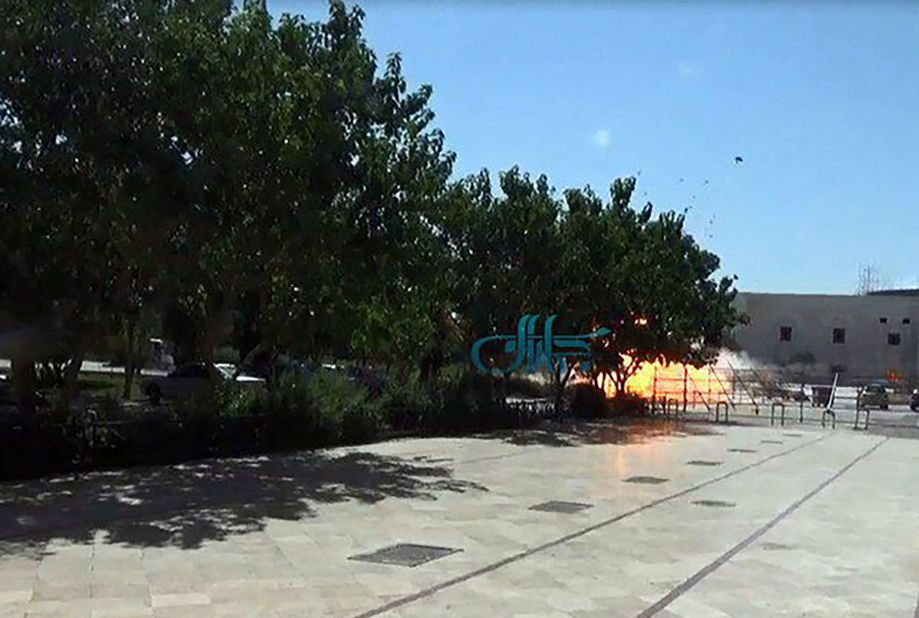 The moment a bomb was detonated on Wednesday, June 7, at the Ayatollah Khomeini shrine near Tehran, Iran, reportedly is shown in this screengrab from a video. Attackers mounted simultaneous gun and suicide-bomb assaults on the shrine and Iran's parliament building in the capital.