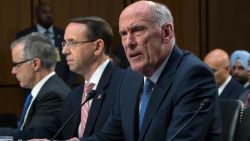 Director of National Intelligence Dan Coats, right, joined by acting FBI Director Andrew McCabe, far left, and Deputy Attorney General Rod Rosenstein, testifies before a Senate Intelligence Committee hearing about the Foreign Intelligence Surveillance Act, on Capitol Hill, Wednesday, June 7, 2017, in Washington. (AP Photo/J. Scott Applewhite)