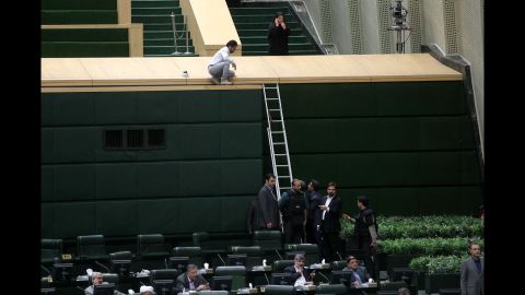 Iranian security personnel deploy inside the parliament building Wednesday to protect lawmakers during the attack.