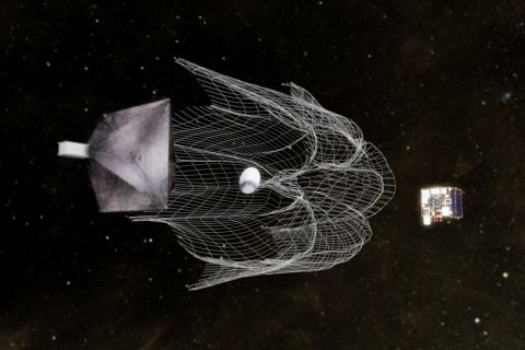 The RemoveDEBRIS team from Surrey Space Centre has designed a system using a net -- much like a fishing net -- to capture debris. The debris would then be dragged behind the space craft as it returns to Earth. 