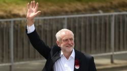 Britain's main opposition Labour Party leader Jeremy Corbyn waves as he arrives to address supporters at a campaign visit in Colwyn Bay, north Wales on June 7, 2017, on the eve of the general election.
Britain on Wednesday headed into the final day of campaigning for a general election darkened and dominated by jihadist attacks in two cities, leaving forecasters struggling to predict an outcome on polling day. / AFP PHOTO / Oli SCARFF        (Photo credit should read OLI SCARFF/AFP/Getty Images)