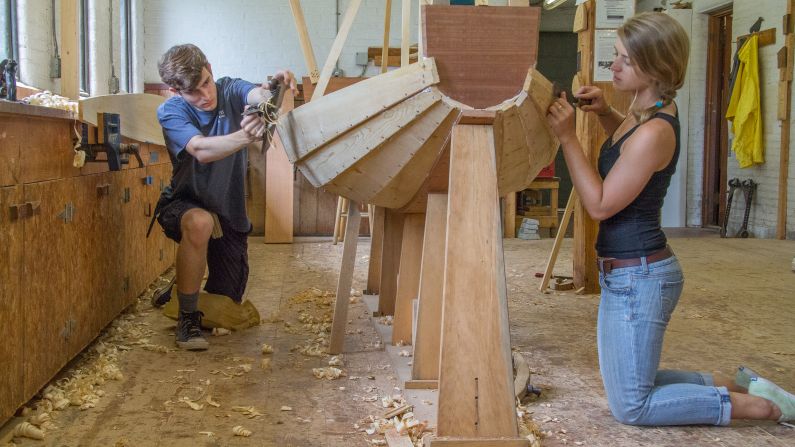 <strong>Building a boat in Maine: </strong>Take a one-, two- or three-week course to learn to build a seaworthy boat at WoodenBoat School. The workshop is next to the water, inspiring the construction process.