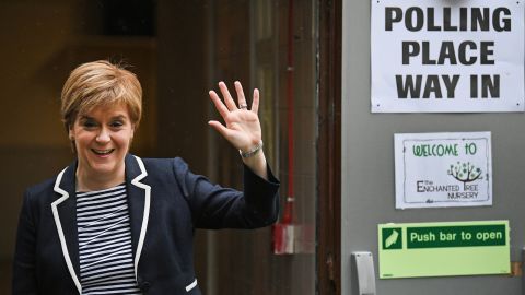  SNP Leader Nicola Sturgeon exits after casting her vote in the general election with her husband Peter Murrel.