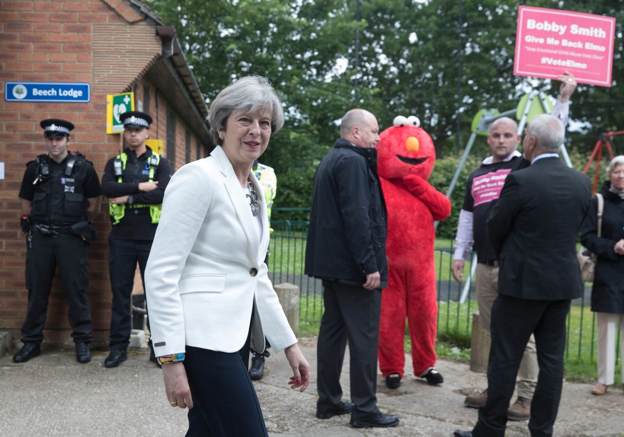 Prime Minister May leaves a polling station in Sonning, England.