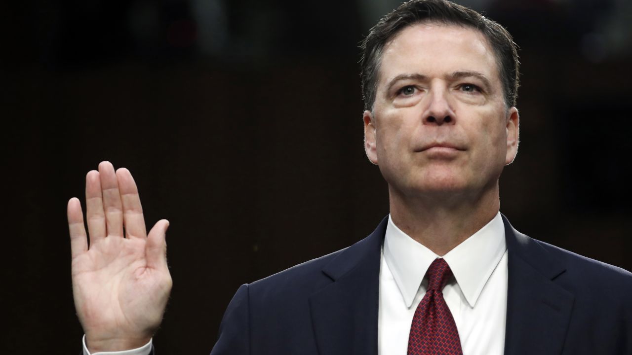 Former FBI director James Comey is sworn in during a Senate Intelligence Committee hearing on Capitol Hill, Thursday, June 8, 2017, in Washington. 