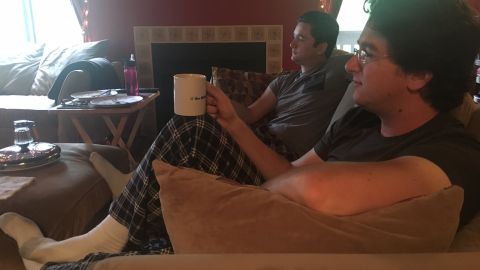 Twin brothers James (left) and David Codeglia watch James Comey's testimony from their condo in the Los Angeles area on Thursday.