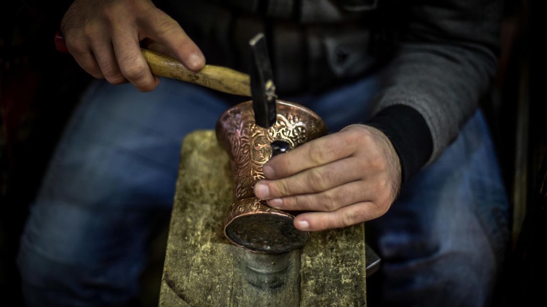 <strong>Handicrafts in </strong><strong>Baščaršija</strong><strong>:</strong><strong> </strong>Grizzled men in some stalls in the bazaar use metal tongs to pull searing copper from a fire and then hammer it into intricately designed plates, trays and goblets.