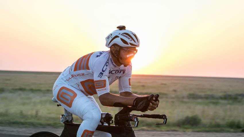With a smile on his face, RAAM Solo rider Gerhard Gulewicz  rides into the night in the plains of Kansas.Photo by Michael D. Ratcliff