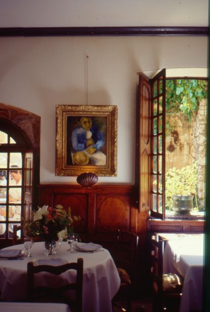 A painting by Pierre Tal-Coat hanging in the dining room.