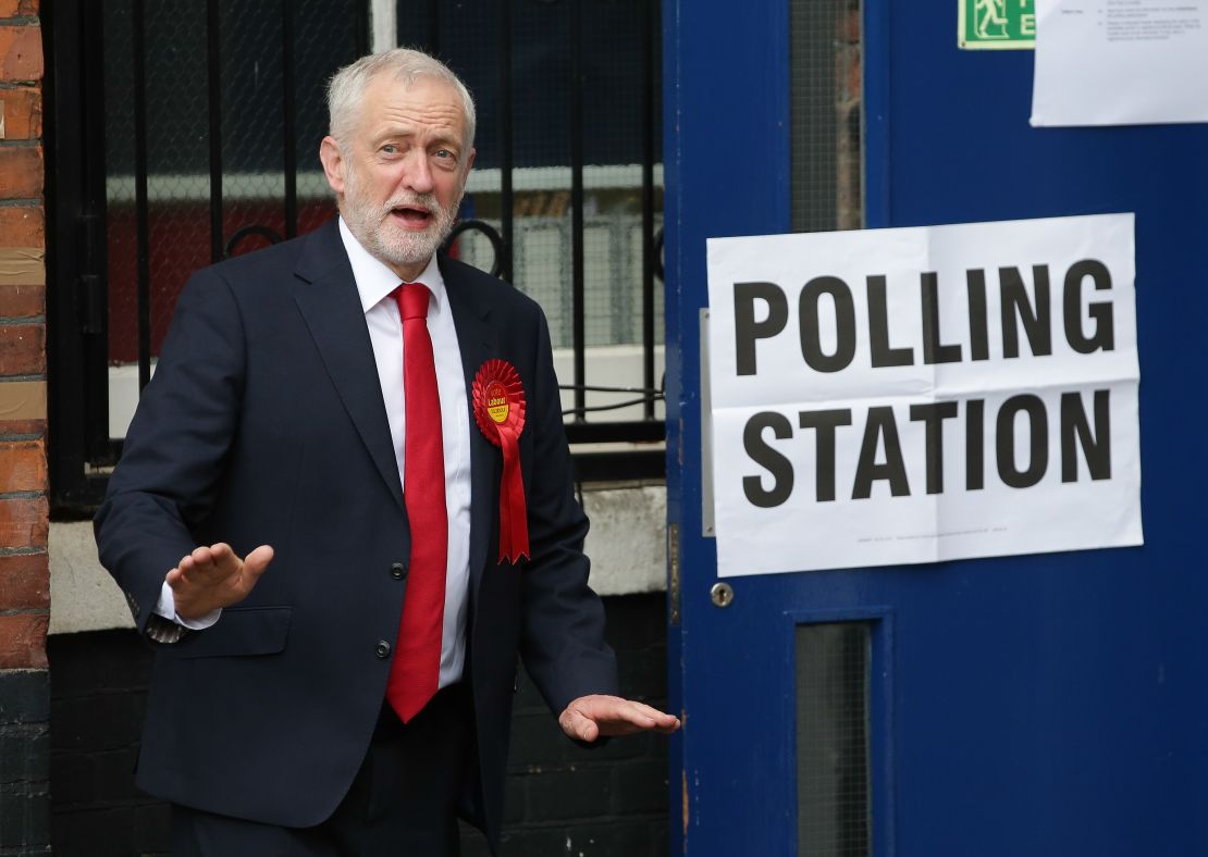 Britain's main opposition Labour Party leader Jeremy Corbyn leaves a polling station after casting his vote.