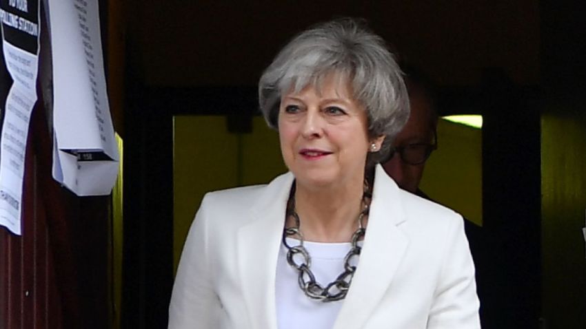 Britain's Prime Minister Theresa May leaves a polling station after casting her ballot paper in Sonning, west of London, on June 8, 2017, as Britain holds a general election.
As polling stations across Britain open on Thursday, opinion polls show the outcome of the general election could be a lot tighter than had been predicted when Prime Minister Theresa May announced the vote six weeks ago. / AFP PHOTO / BEN STANSALL        (Photo credit should read BEN STANSALL/AFP/Getty Images)