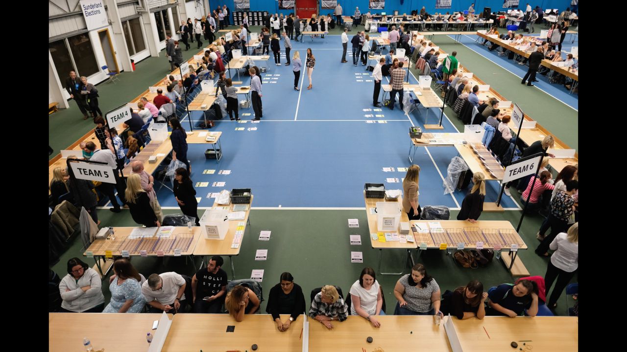 Election staff take their seats before counting votes in Sunderland, England.