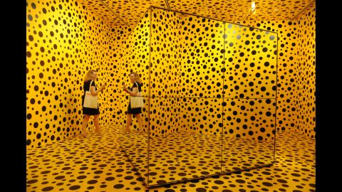 A visitor views the ''Yayoi Kusama: Life Is the Heart of a Rainbow'' exhibition at the National Gallery Singapore on Tuesday, June 6.
