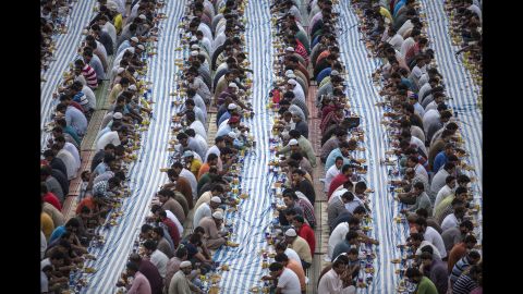 Muslims attend Iftar dinner during the holy month of Ramadan in Dubai, United Arab Emirates, on Monday, June 5. Iftar is the first meal eaten by Muslims after sunset during Ramadan.
