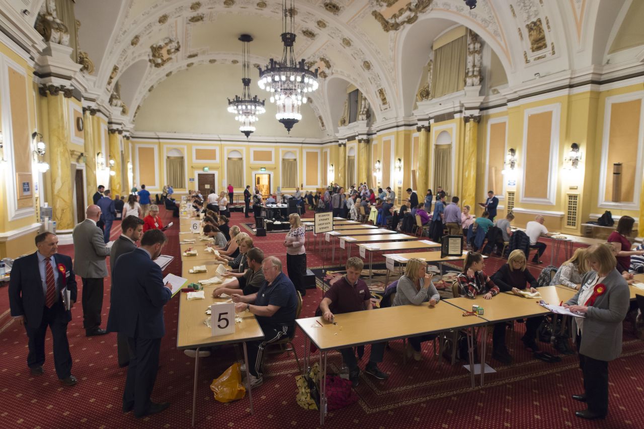Ballots are counted at City Hall in Cardiff, Wales.