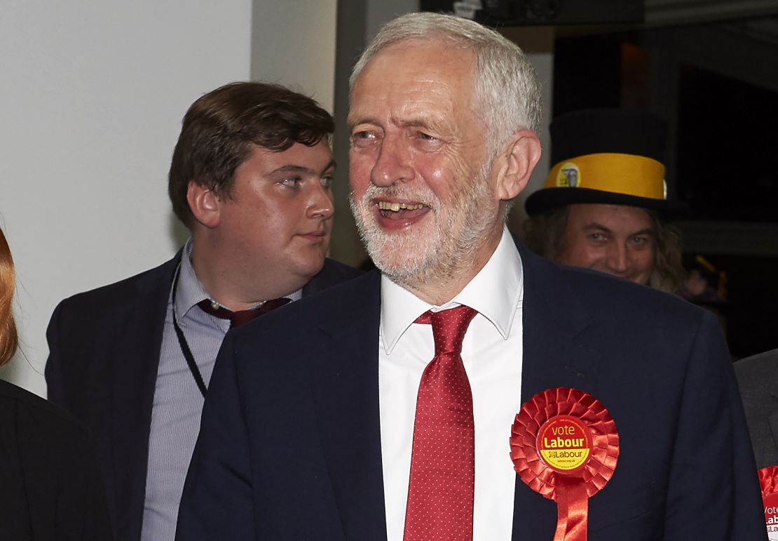 A smiling Jeremy Corbyn arrives at the count center in north London.