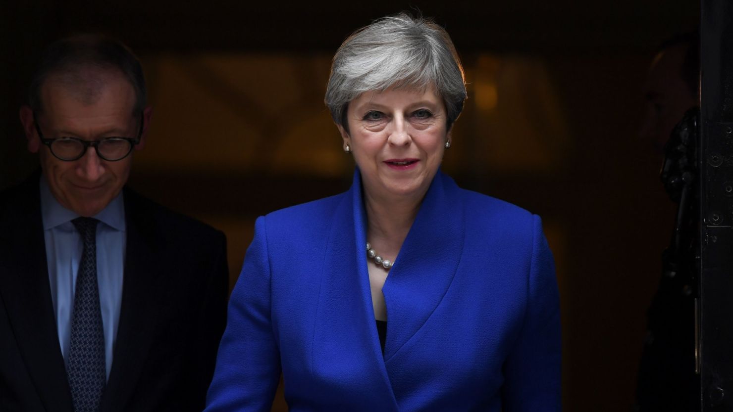 Britain's Prime Minister and leader of the Conservative Party Theresa May leaves 10 Downing Street in central London on June 9, 2017, after losing her majority in the general election. 