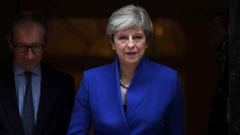 Britain's Prime Minister and leader of the Conservative Party Theresa May leaves 10 Downing Street in central London on June 9, 2017, after losing her majority in the general election. 