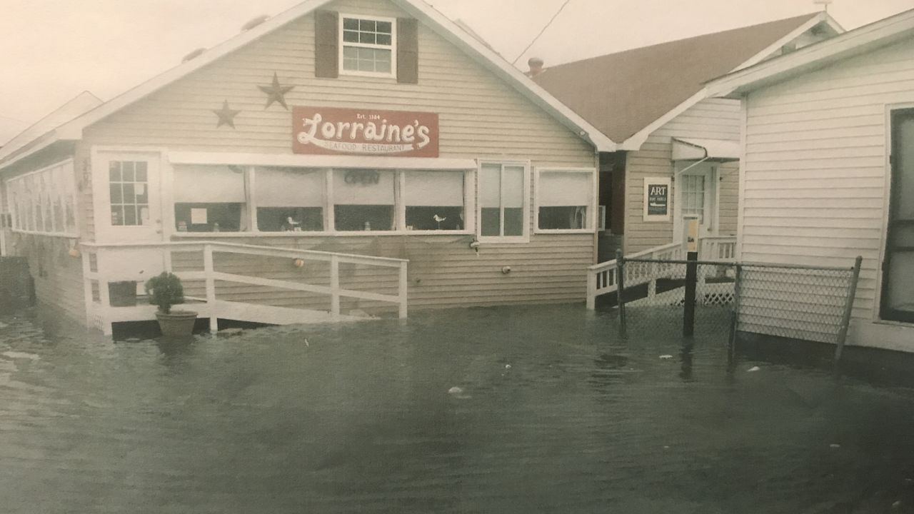 In 2012 during Superstorm Sandy, Mayor James "Ooker" Eskridge snapped this picture of the storm surge pushing up against the local Tangier's restaurant, Lorraine's. 