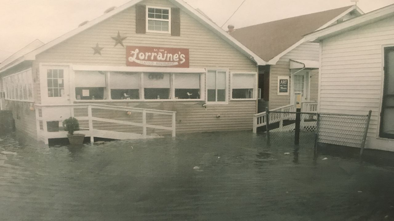In 2012 during Superstorm Sandy, Mayor James "Ooker" Eskridge snapped this picture of the storm surge pushing up against the local Tangier's restaurant, Lorraine's.