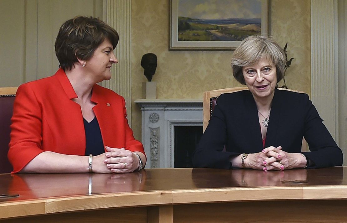 Arlene Foster, (left) leader of the Democratic Unionist Party, sits with Theresa May. The British Prime Minister needs the support of the DUP in Northern Ireland to form a new government. 