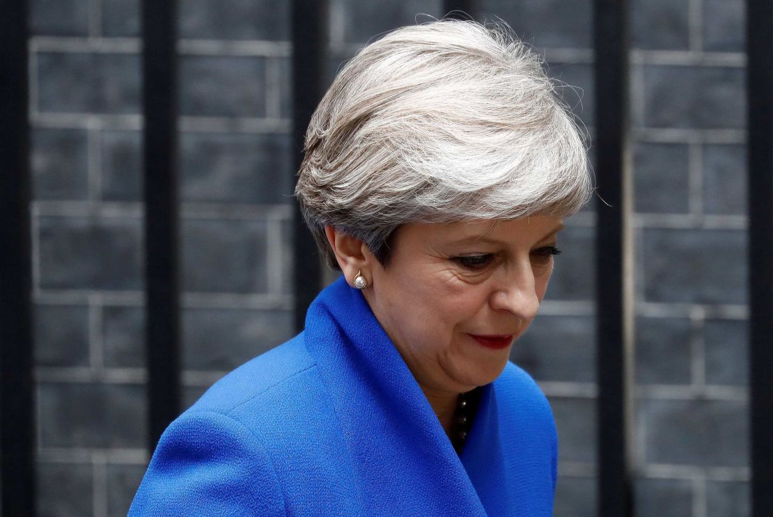 Britain's Prime Minister and leader of the Conservative Party Theresa May leaves 10 Downing Street en route to Buckingham Palace.