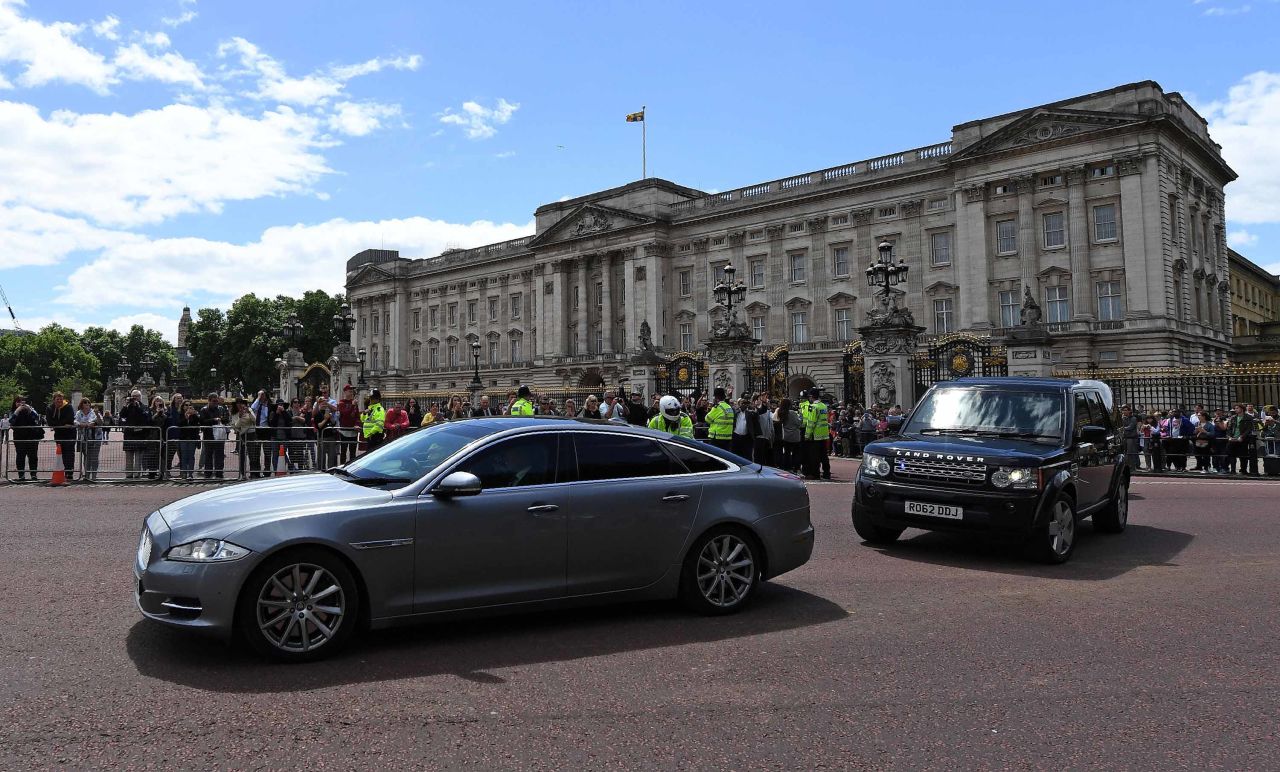 A car takes May away from Buckingham Palace after her meeting with the Queen. May was the one who called for the snap election three years earlier than required by law.