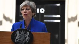 Britain's Prime Minister and leader of the Conservative Party Theresa May delivers a statement outside 10 Downing Street in central London on June 9, 2017 as results from a snap general election show the Conservatives have lost their majority.
