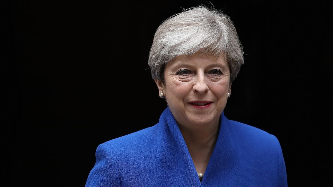 Theresa May leaves Downing Street after a snap election in which the Conservative Party lost its majority.