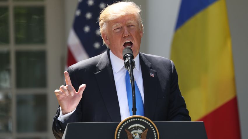 President Donald Trump, accompanied by Romanian President Klaus Werner Iohannis, speaks during a news conference in the Rose Garden at the White House, Friday, June 9, 2017, in Washington. (AP Photo/Andrew Harnik)