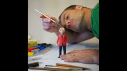Sculptor Mark Leavitt works on the Warren action figure.